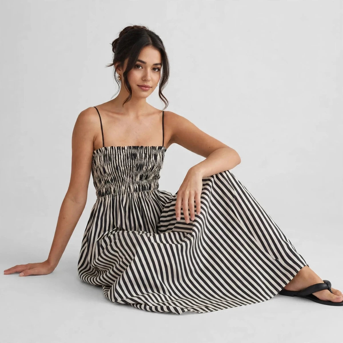 black and white smocked striped cami maxi dress – seated front view
