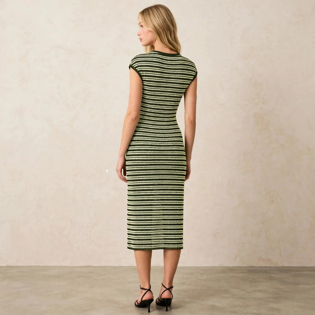 Women's dark green and mint striped bodycon midi dress, back view