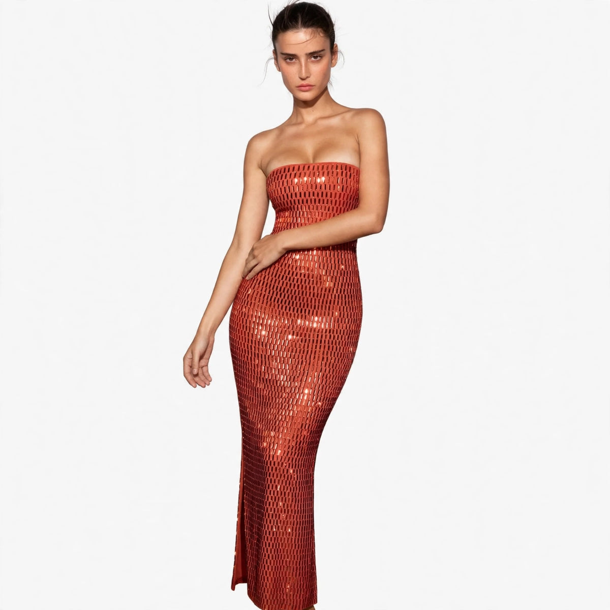 Model in burnt coral sequin strapless tube maxi dress, front view