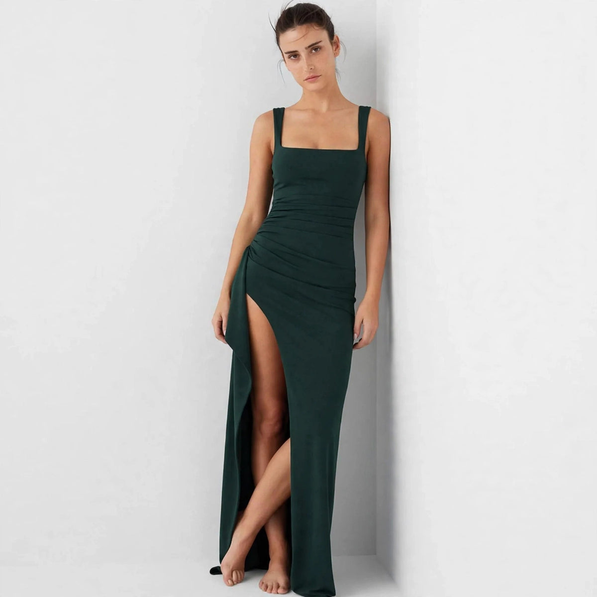 dark green ruched high slit maxi dress – front view
