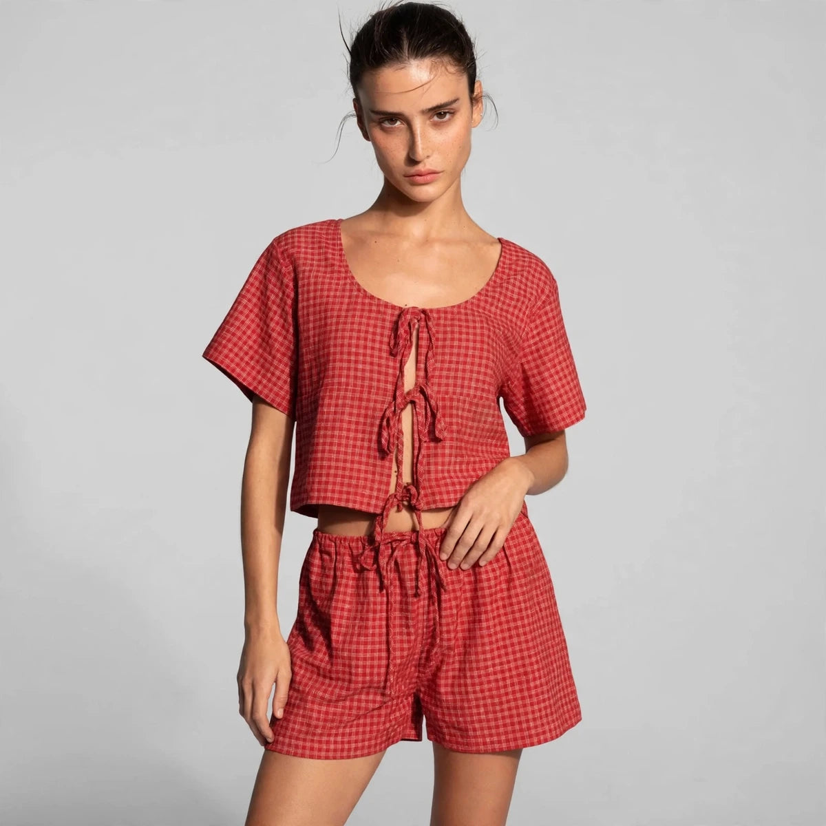 deep red plaid tied scoop neck short sleeve top and drawstring shorts set – front view