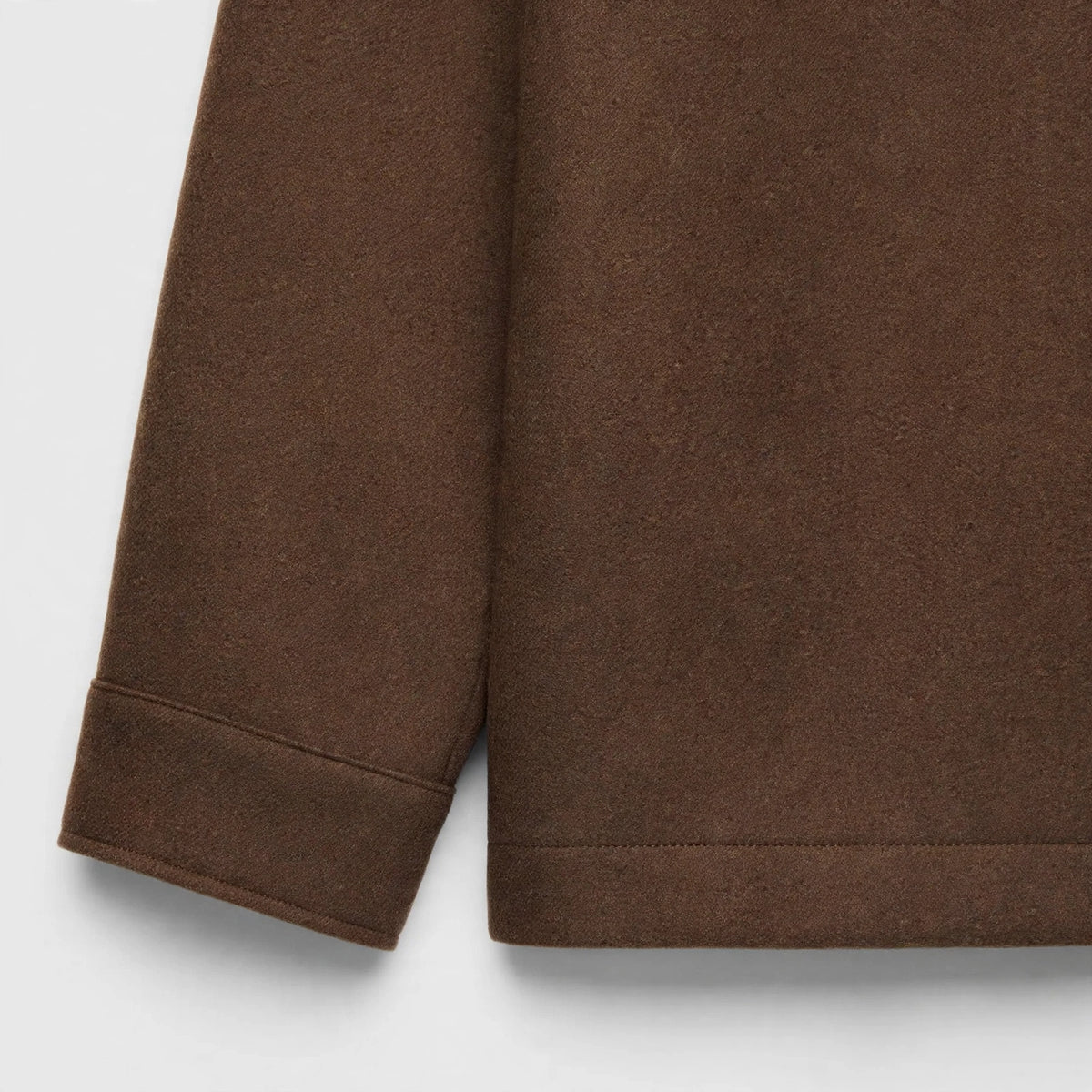 Dropped Shoulder Jacket in Brown – cuff close-up