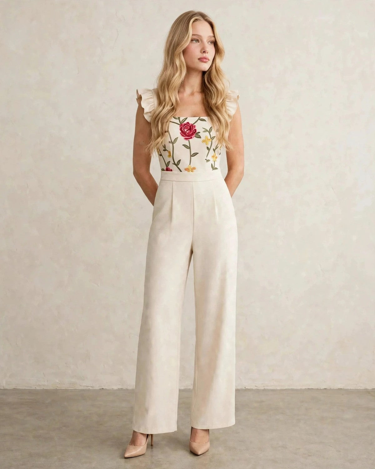 Women's floral ruffle wide-leg jumpsuit in Beige, front view