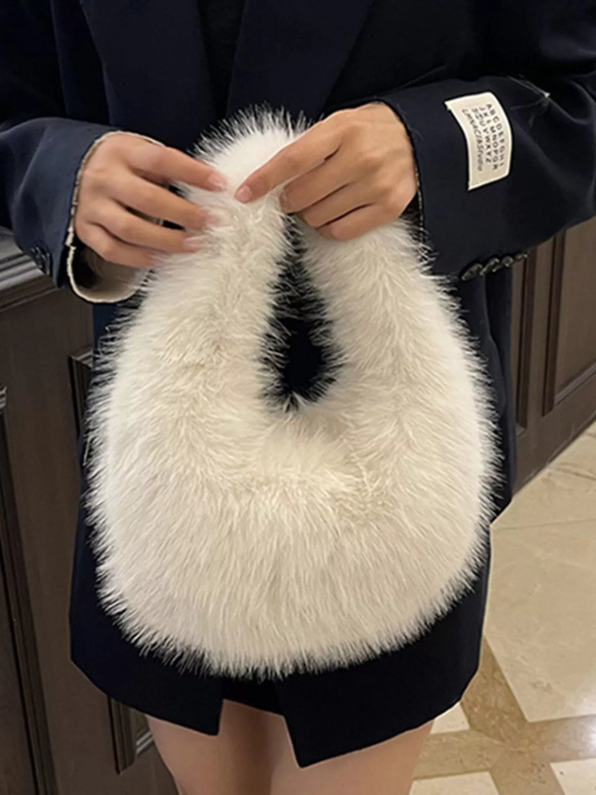 Fluffy mini handbag product detail | Orleve