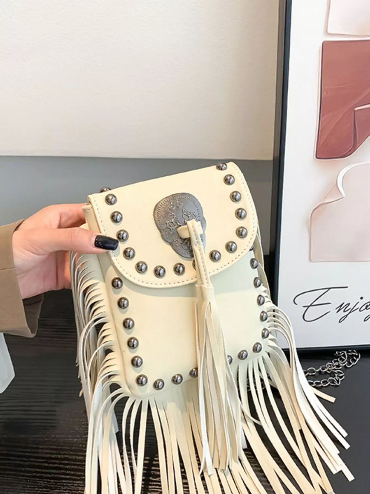 Fringe rivet mini crossbody bag detail | Orleve