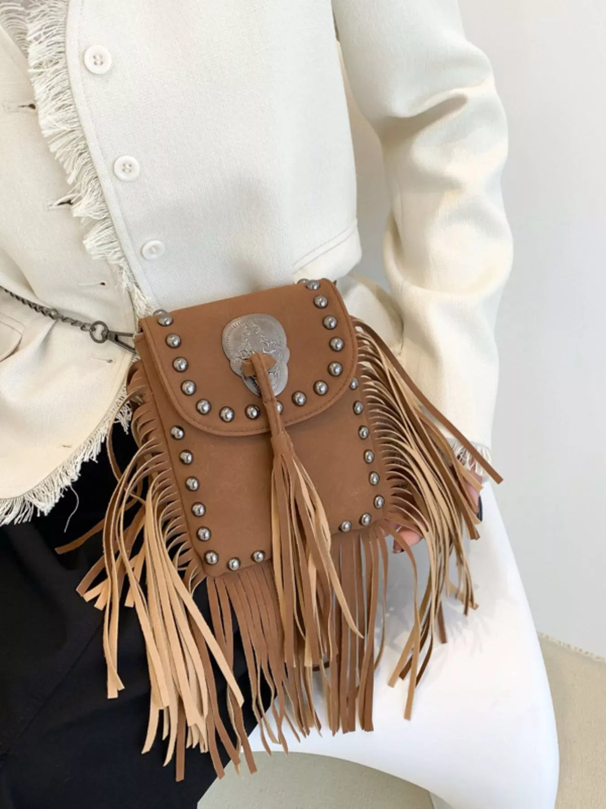Fringe rivet mini crossbody bag back view | Orleve