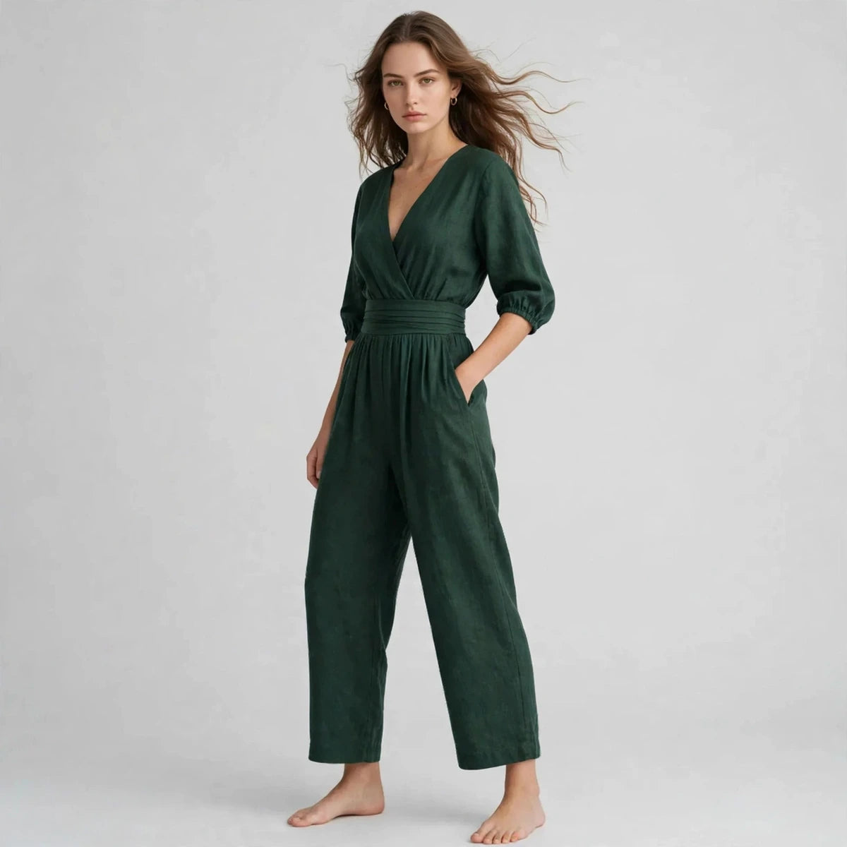 Dark green half sleeve jumpsuit with v-neckline, three-quarter view