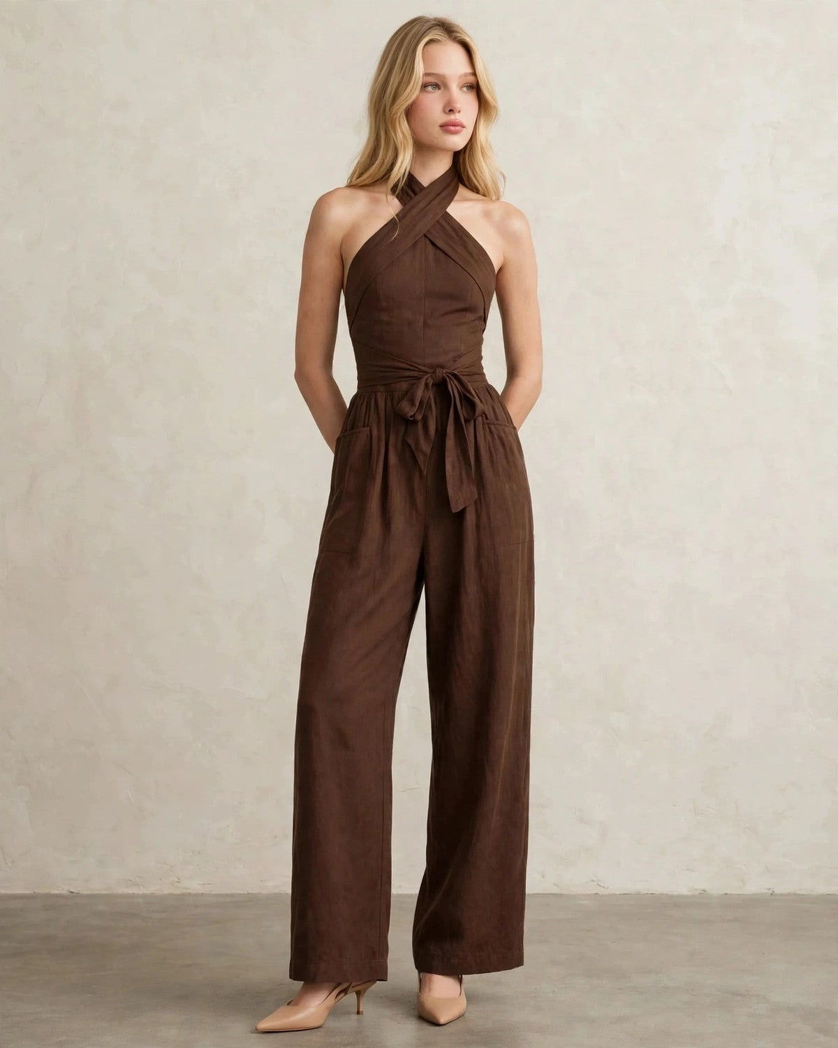 Women's halter neck wide-leg jumpsuit with waist tie in Brown, front view