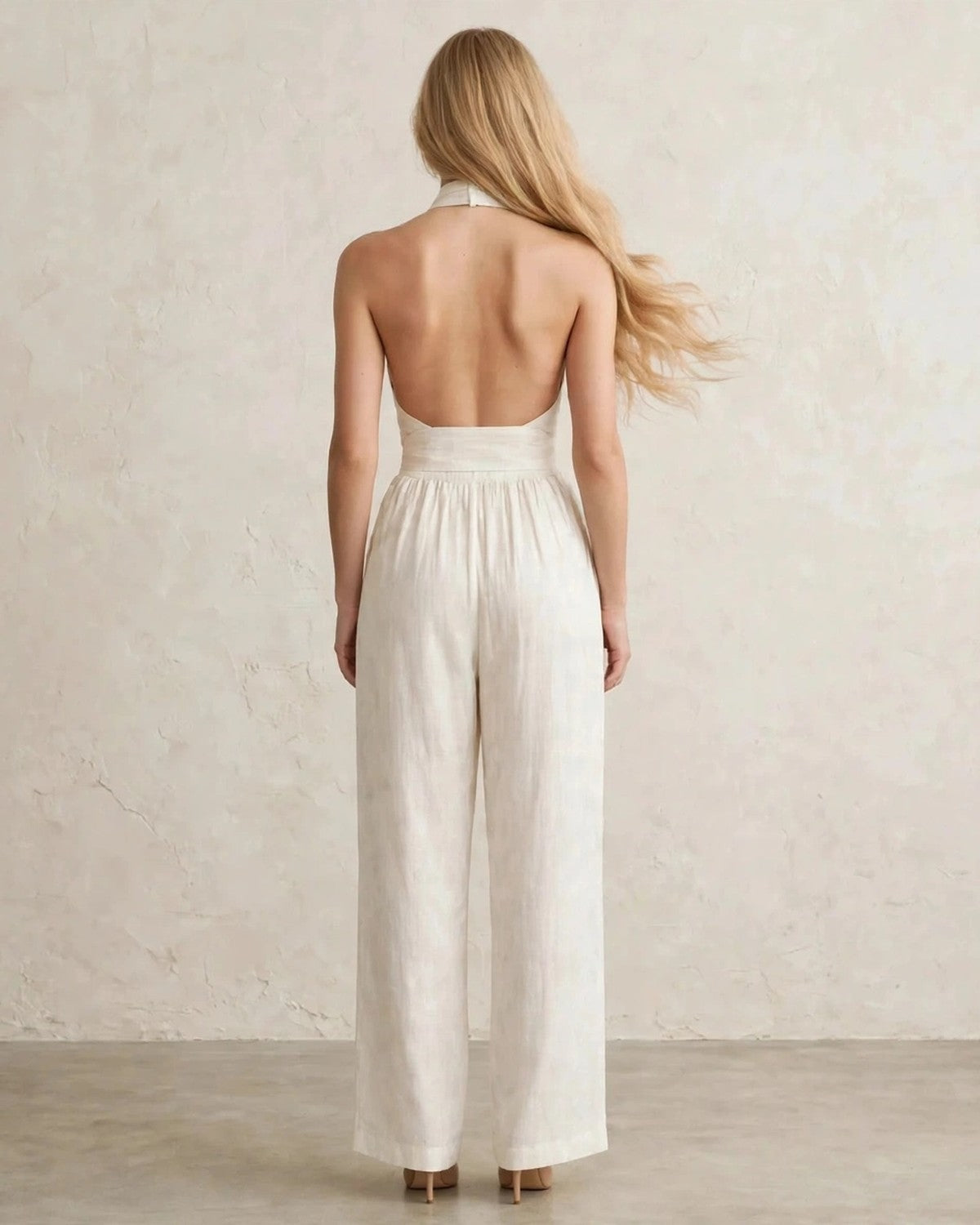 Women's halter neck wide-leg jumpsuit with waist tie in Milky White, back view