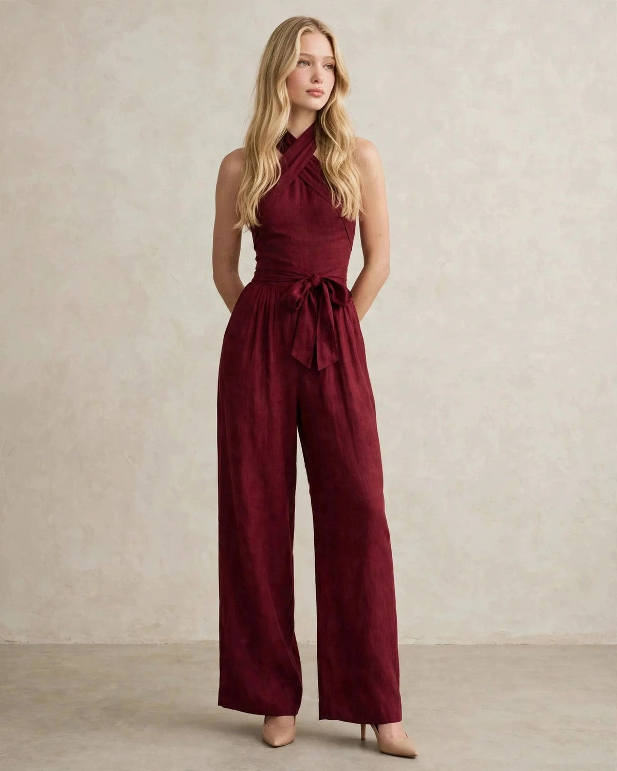 Women's halter neck wide-leg jumpsuit with waist tie in Wine Red, front view
