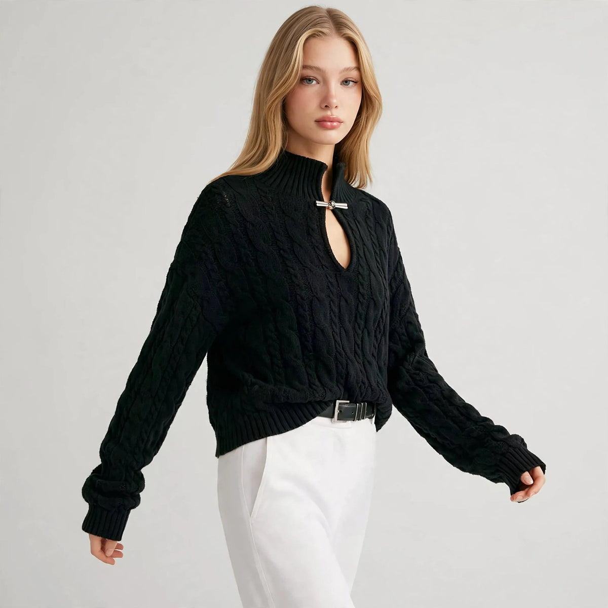 Cable-Knit Keyhole Sweater in Black – mid-step view