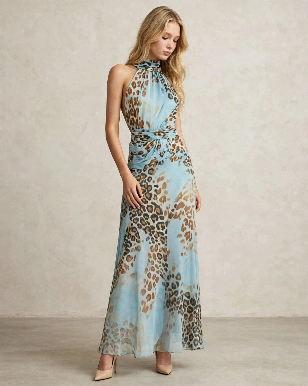 Women's leopard print halter maxi dress in sky blue, relaxed front pose
