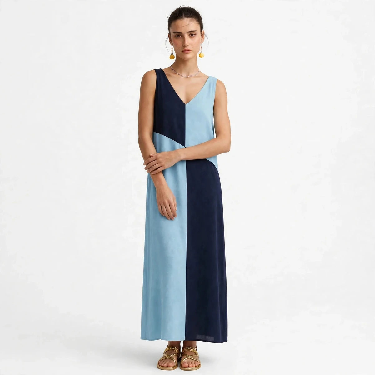 Back view of light blue and navy color-block sleeveless maxi dress