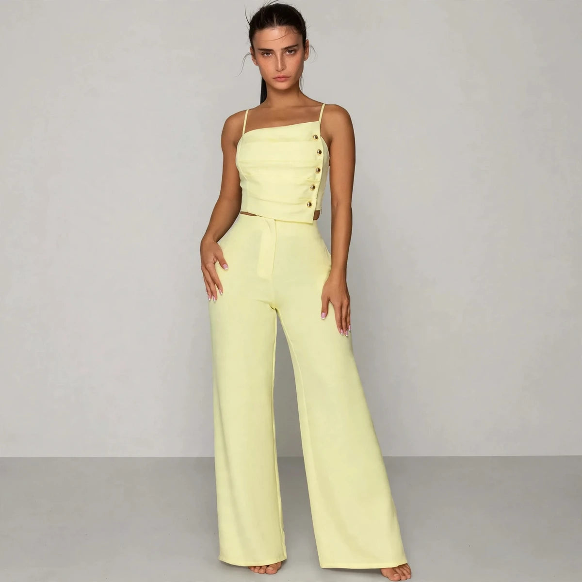 light yellow decorative button smocked back cami and wide leg pants set – model editorial view