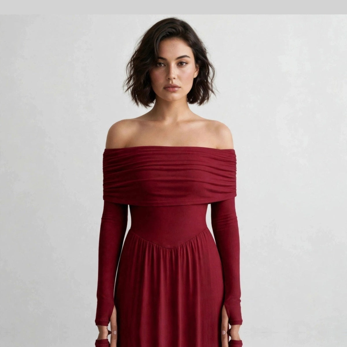 Three-quarter view of burgundy off-shoulder long sleeve maxi dress
