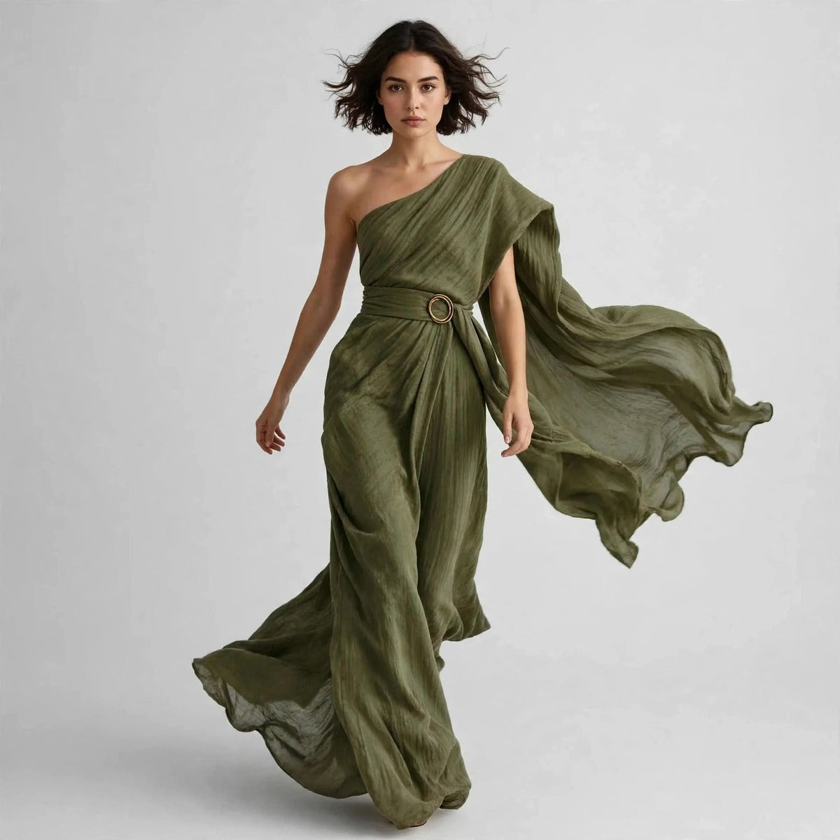 Model twirling in army green draped one-shoulder maxi dress