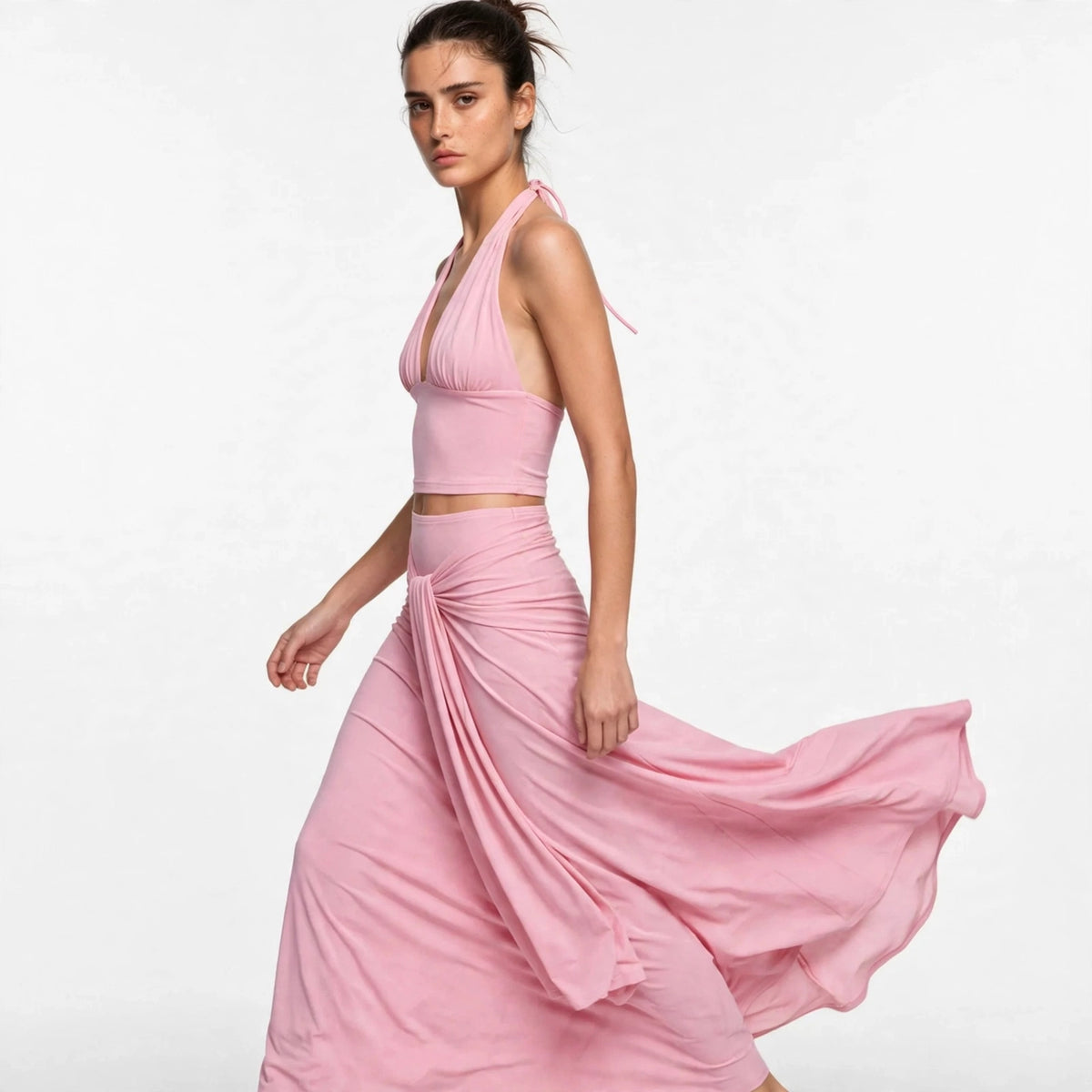 Back view of pink halter top and draped maxi skirt set