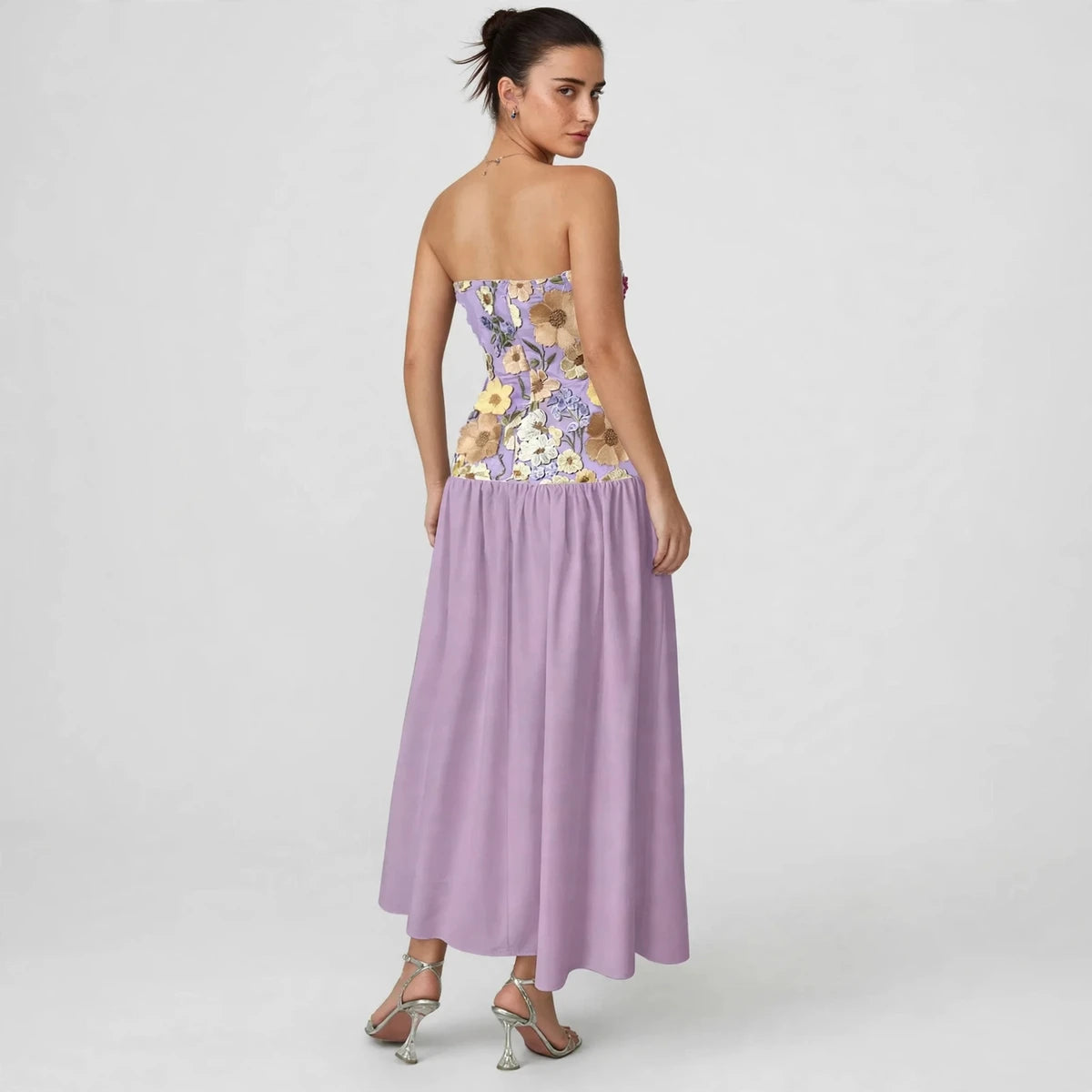 Back view of purple floral embroidered tube maxi dress