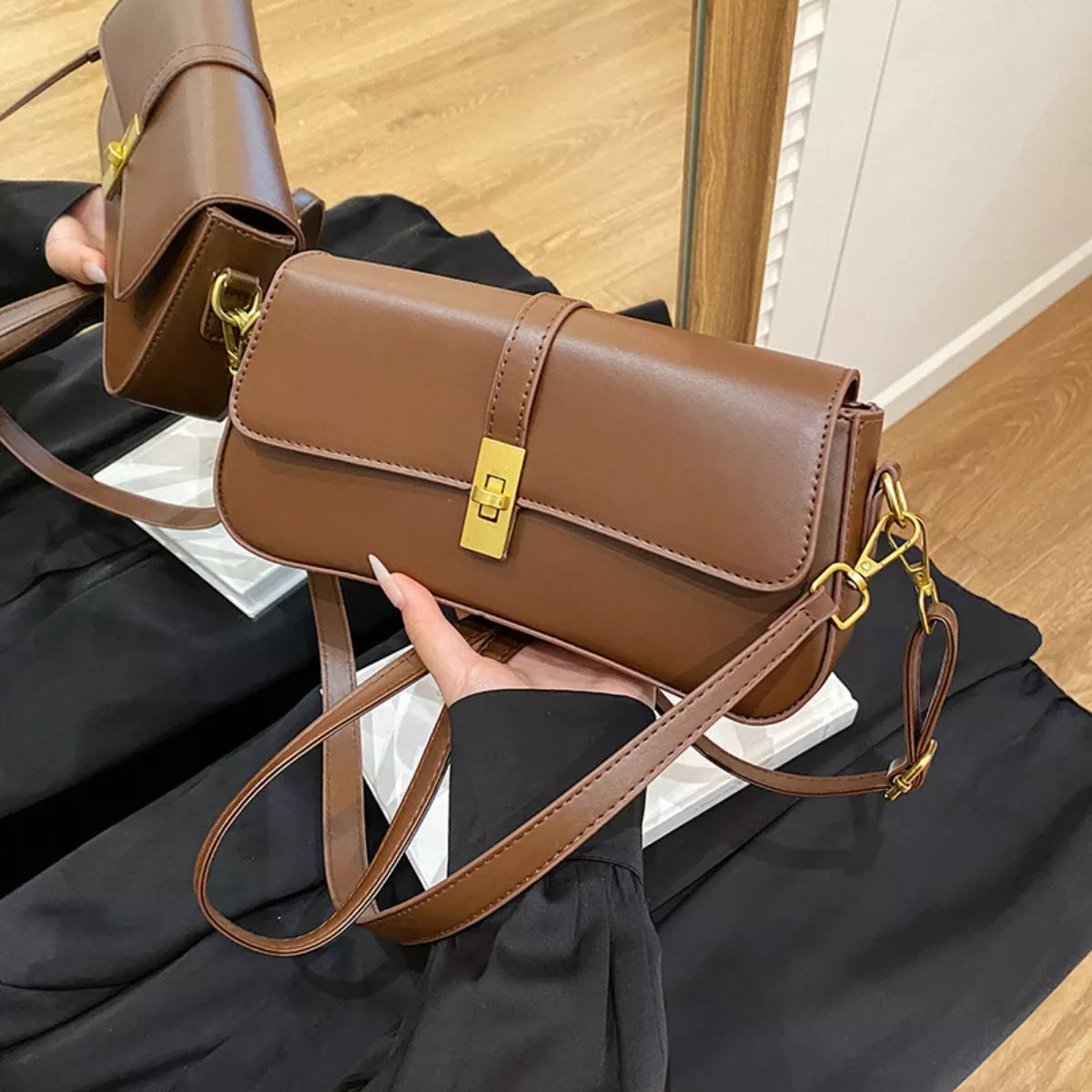 Rectangular golden buckle crossbody bag rear view | Orleve