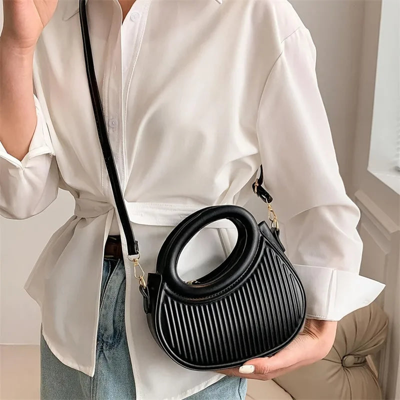 Sequin crescent shoulder bag close view | ORLEVE