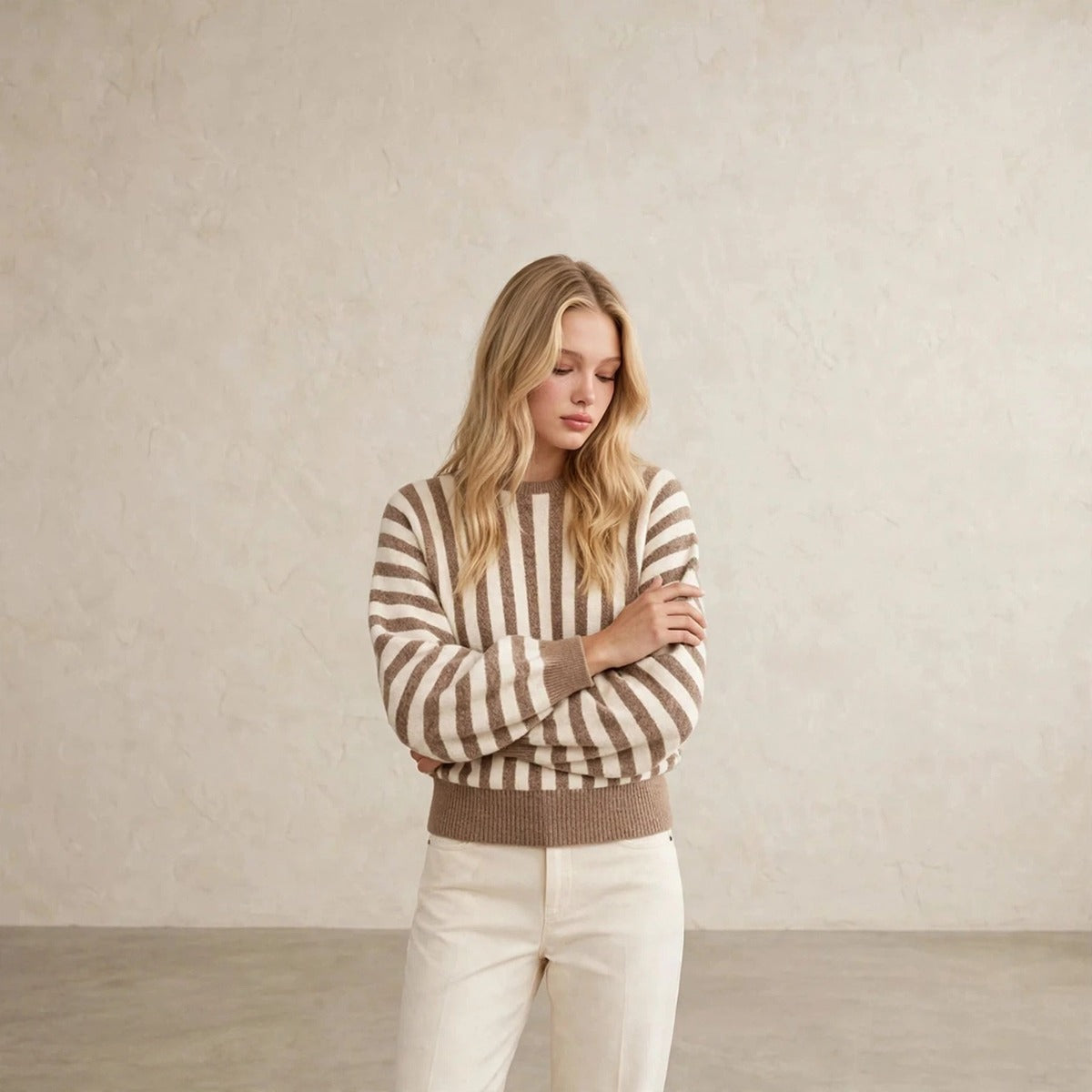 Women's khaki and cream vertical striped crew neck sweater, front view