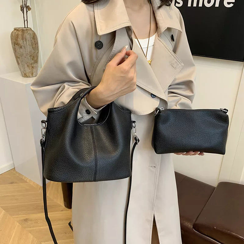 Textured leather crossbody bag with matching pouch front view | Orleve