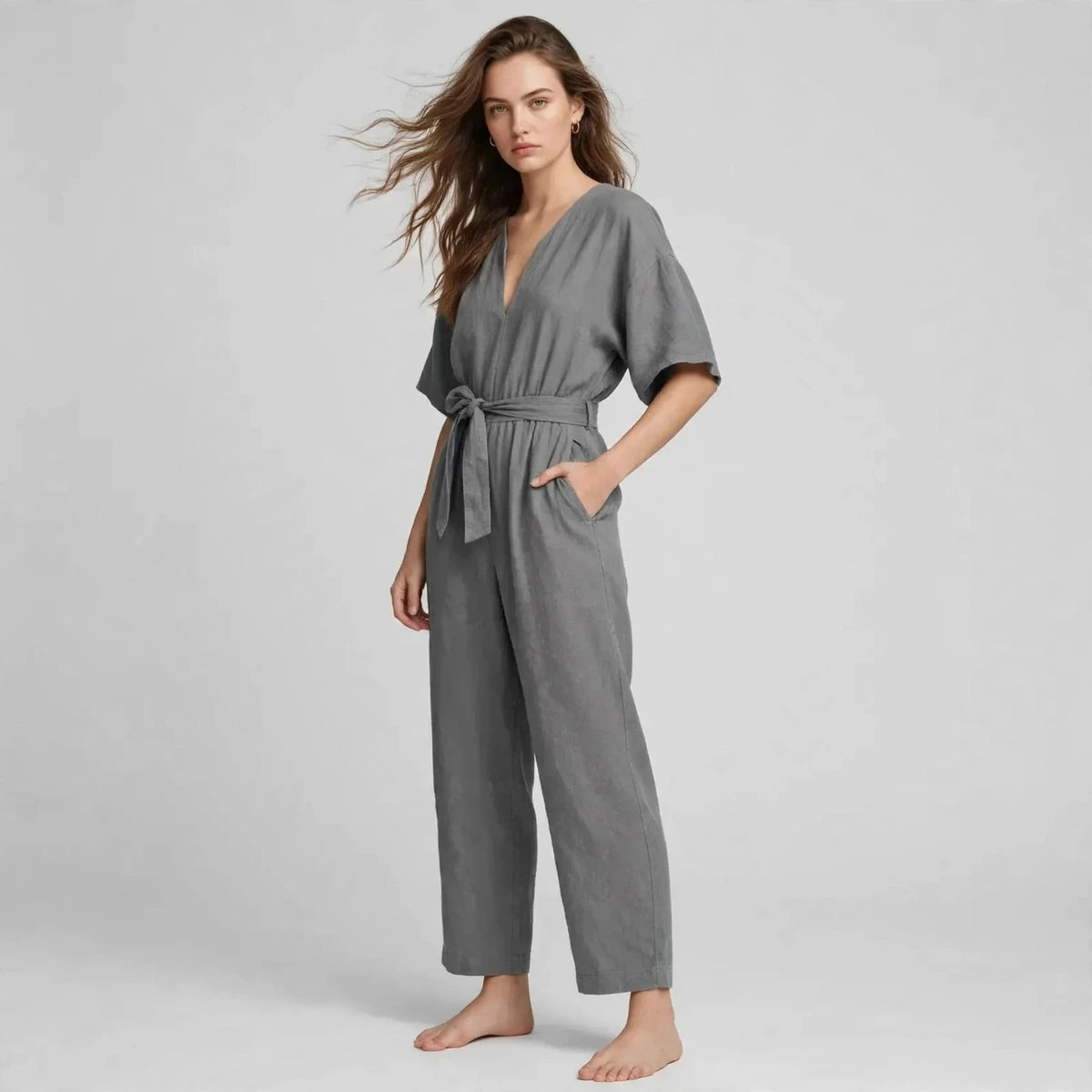 Women's gray tie-waist jumpsuit, three-quarter view