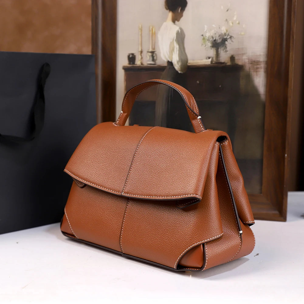 Vintage leather crossbody satchel bag view | ORLEVE