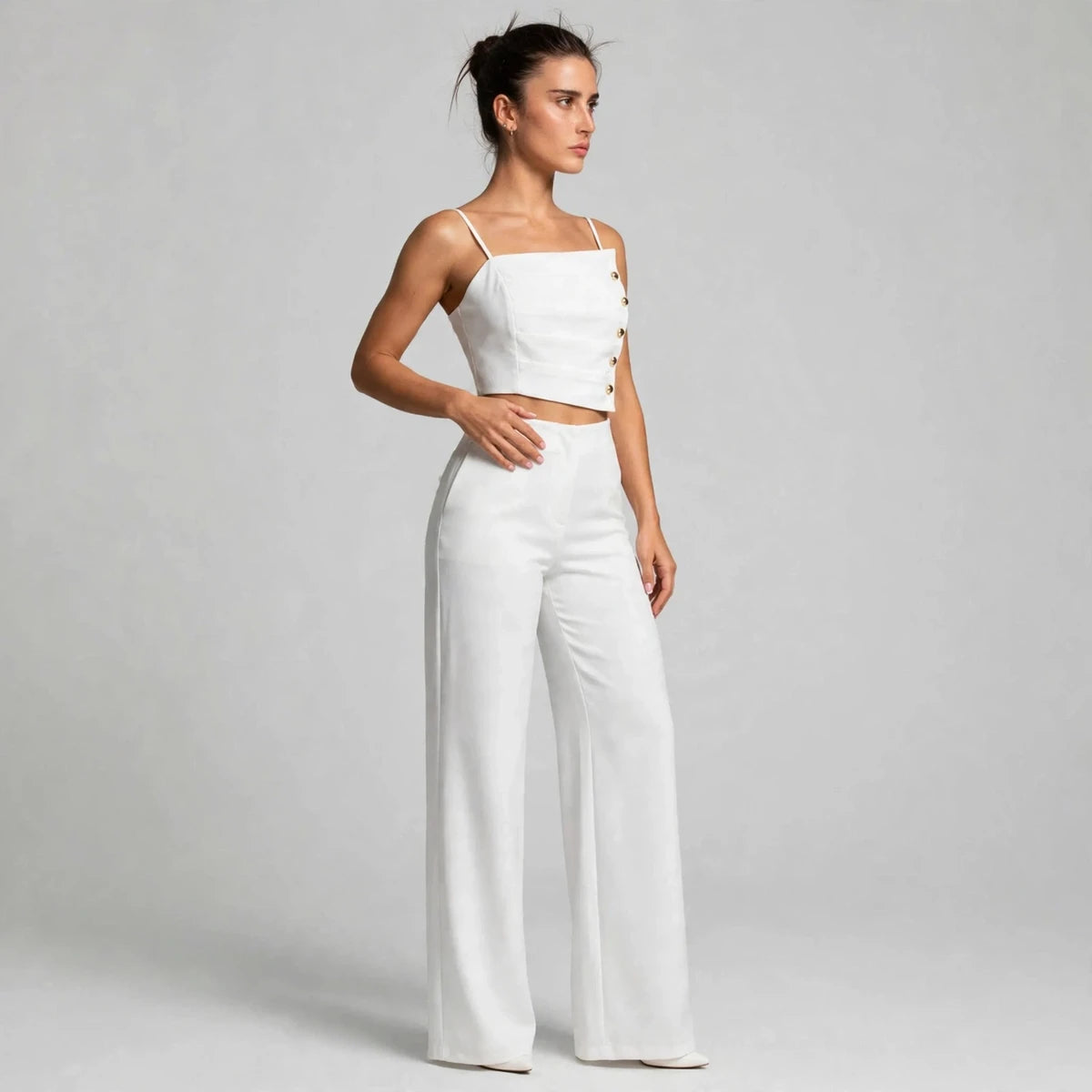 Side view of white button cami top and wide-leg pants set